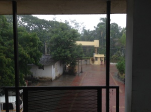 The view off the balcony of the community health building during a torrential downpour - even though it's hard to tell in the photo.